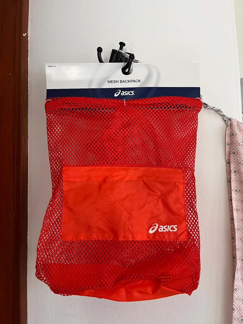 ASICS Bright Orange Mesh Drawstring Backpack